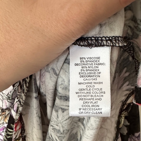 CUPIO | Boho Black Floral Women's Top with Trumpet Bell Sleeves and Lace Details - Picture 7 of 10